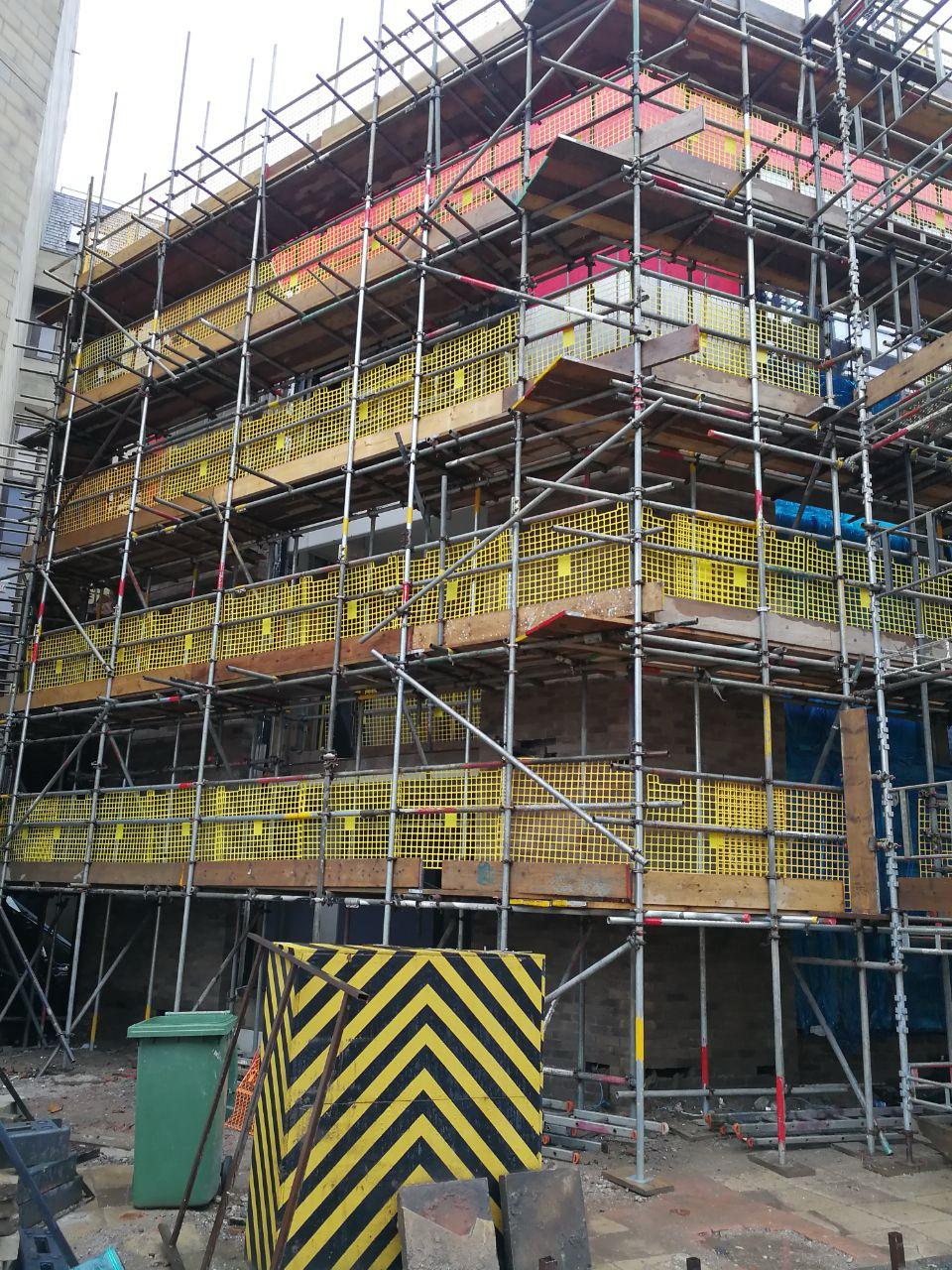 Scaffolded exterior of the Octagon Theatre during redevelopment