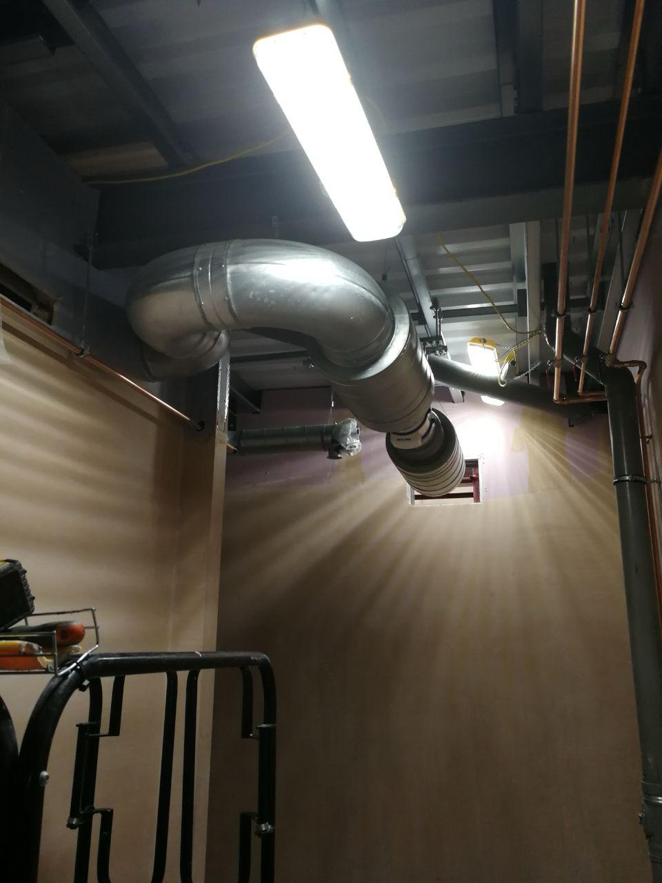 New ventilation ductwork installed above a theatre corridor