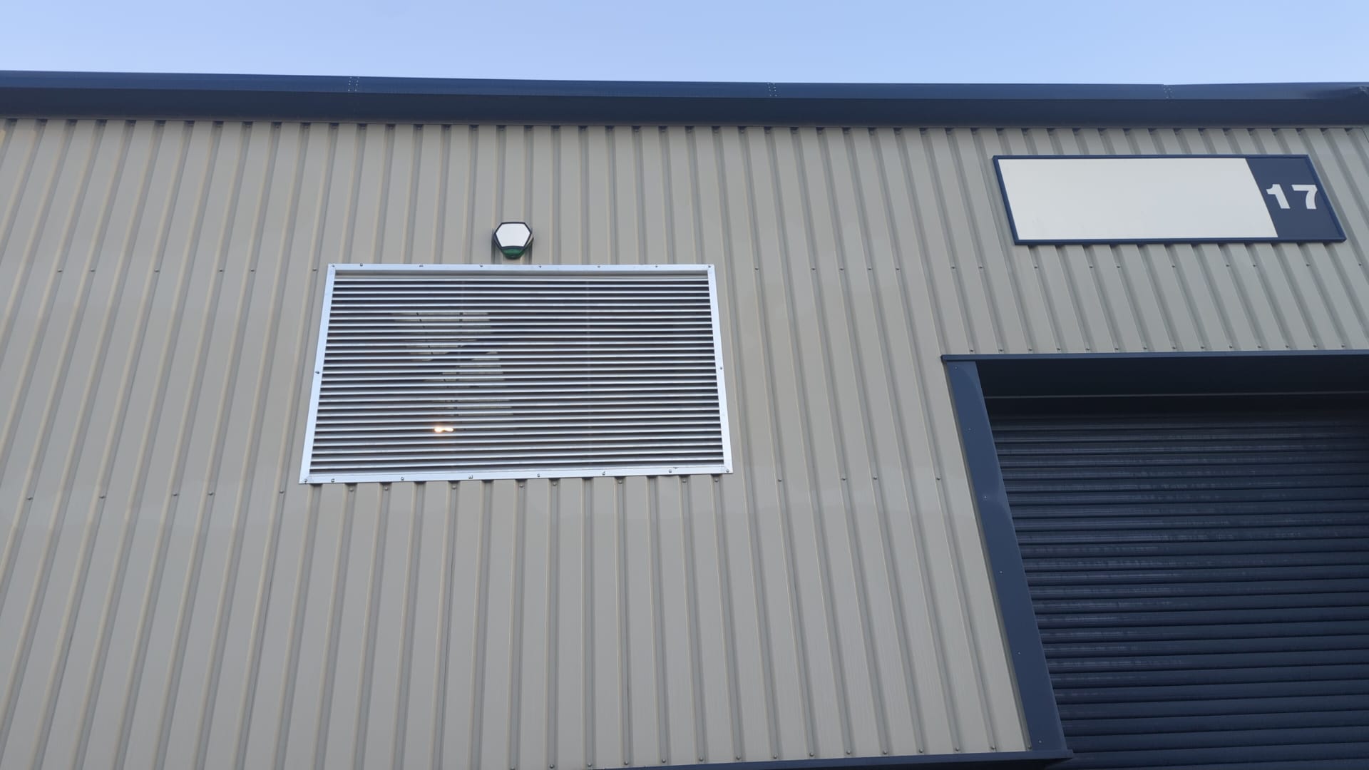 Close-up of the external ventilation louvre installed to serve the refrigeration plant